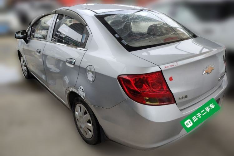 Used Chevrolet Sail 2013 Sedan 1.2L Manual Ideal Edition Rear Left 45 Deg
