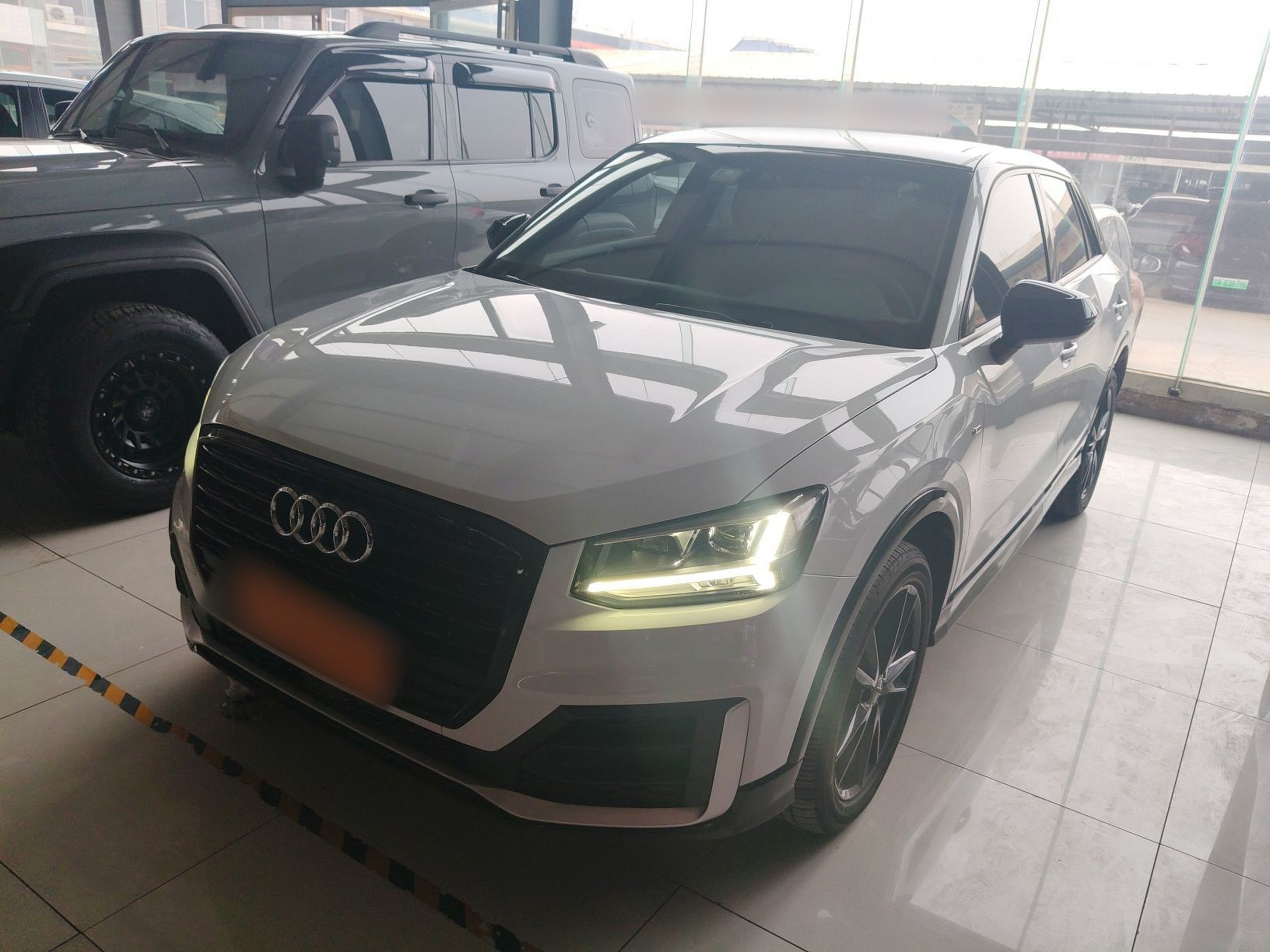 Под передней частью автомобиля