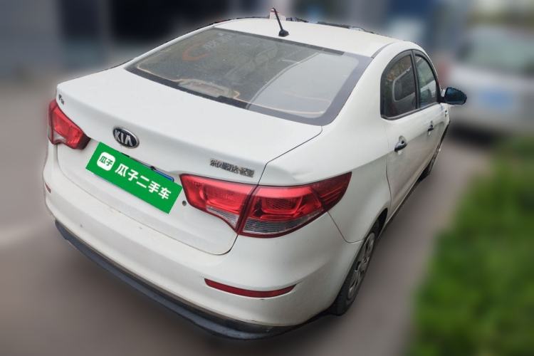 Used Kia K2 2015 Sedan 1.4L Manual Transmission GL Rear Right 45 Deg