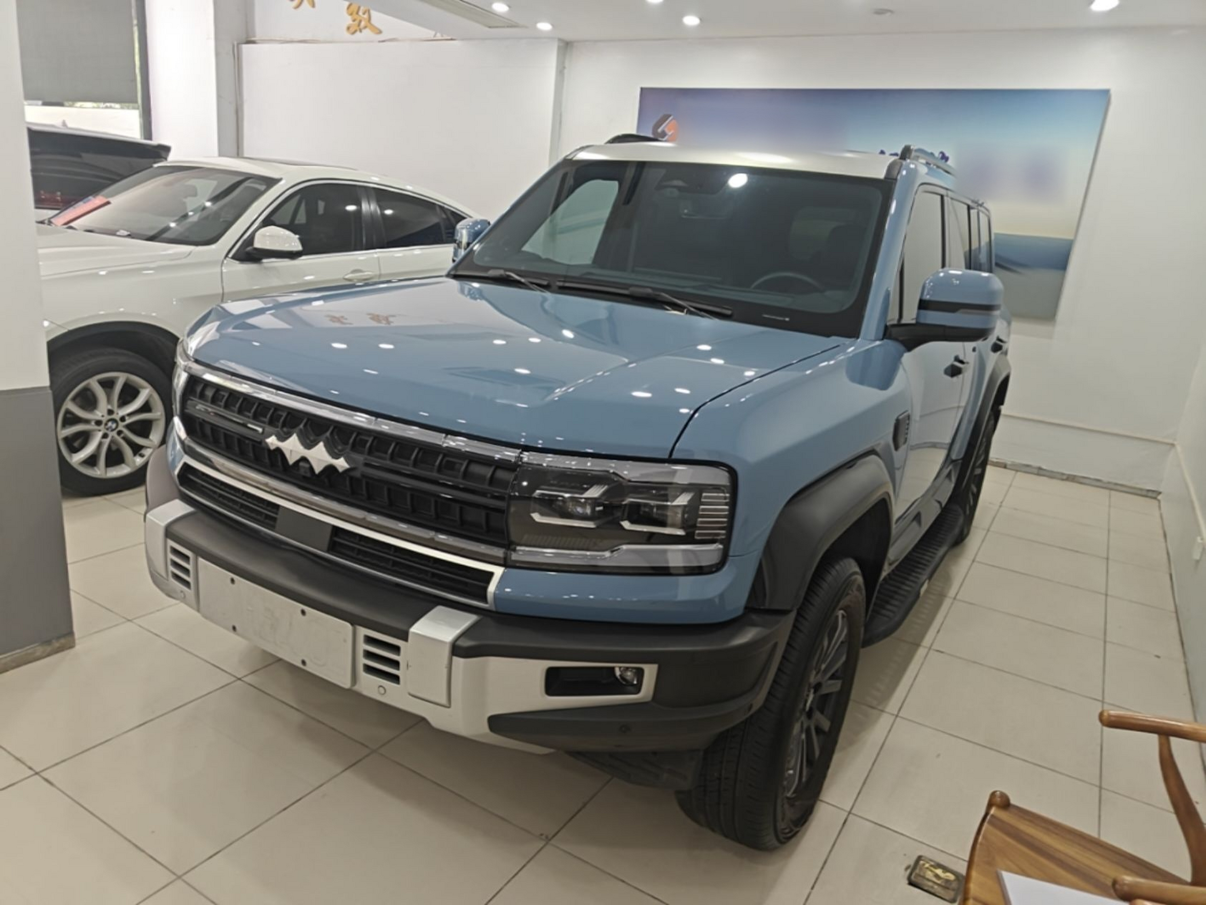 Под передней частью автомобиля