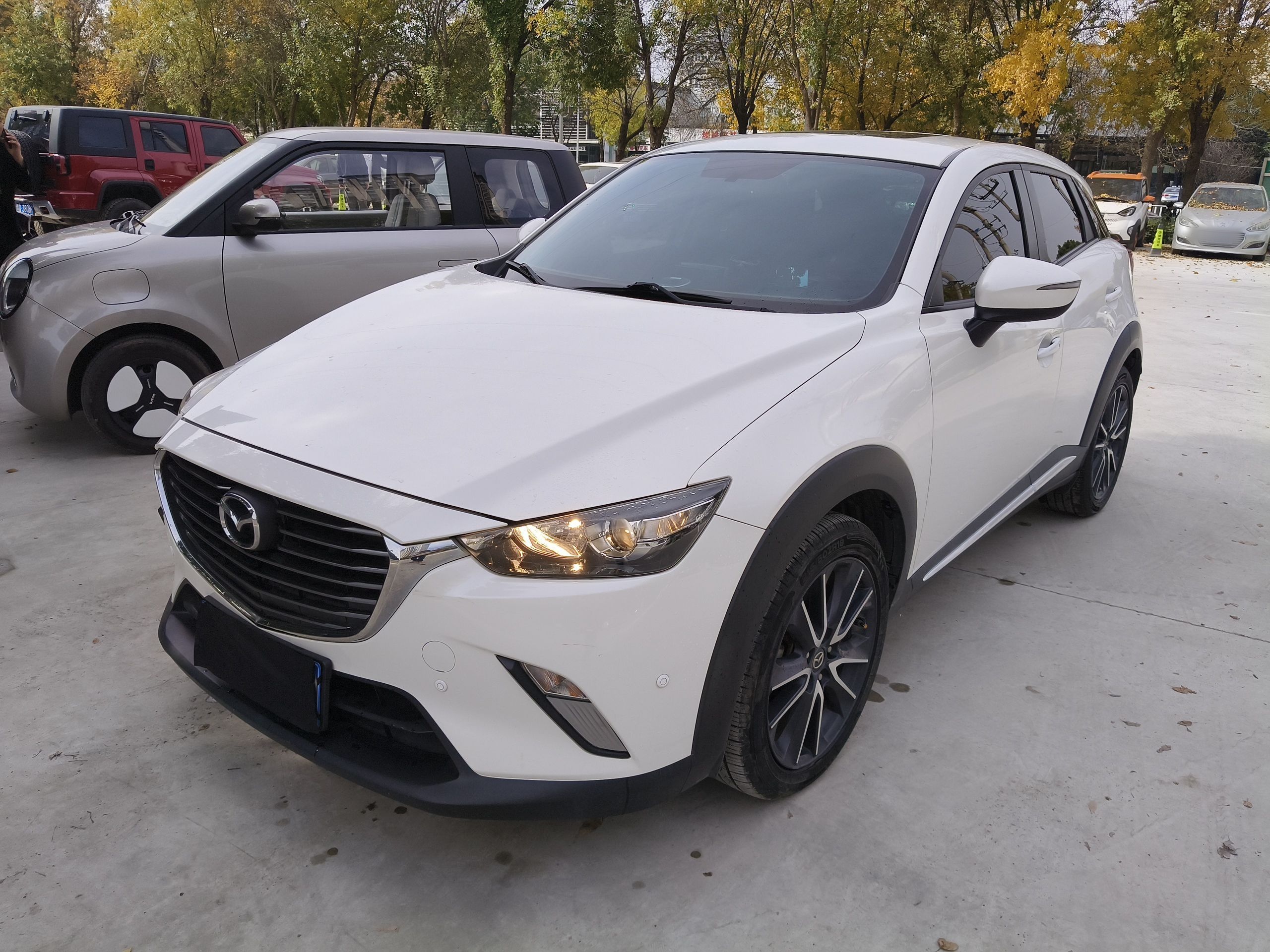 Под передней частью автомобиля