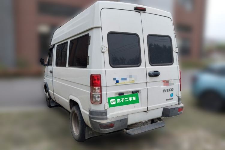 Used Iveco Daily 2021 2.5T A35 M1 Passenger Van 5-9 Seater Short Wheelbase Mid-Roof Design Dual Tires Manual Doors Rear Left 45 Deg