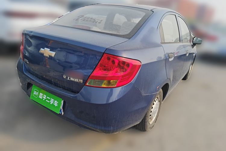 Used Chevrolet Sail 2013 Sedan 1.2L Manual Fashionable Happiness Edition Rear Right 45 Deg