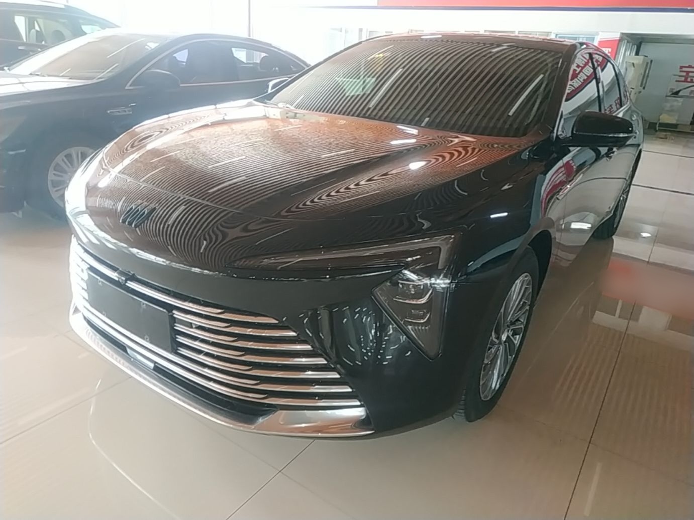 Under the front of the car