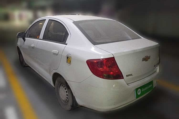 Used Chevrolet Sail 2013 Sedan 1.2L Manual Fashionable Happiness Edition Rear Left 45 Deg