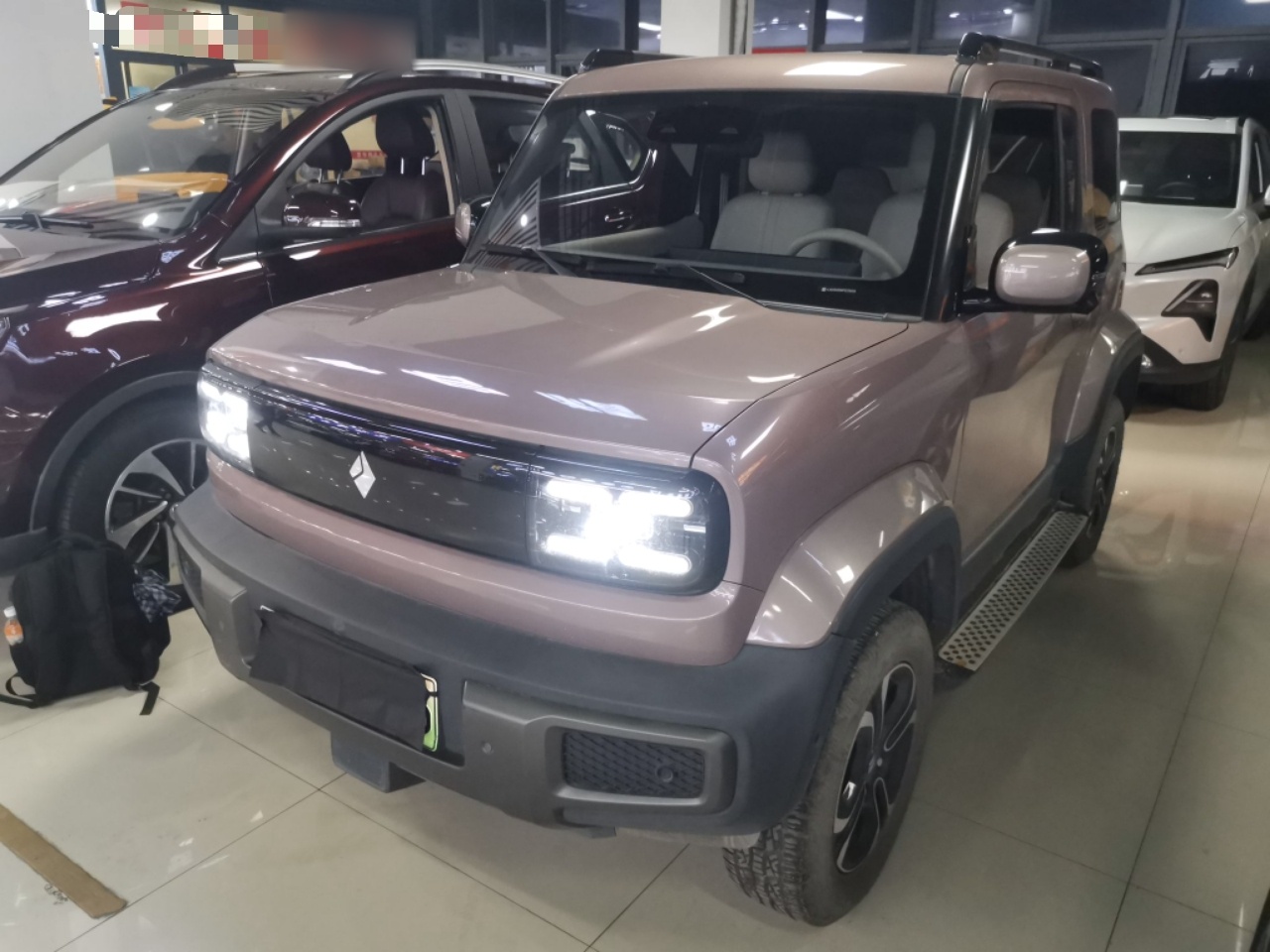 Под передней частью автомобиля