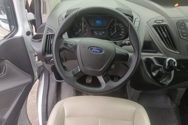 Used Ford Transit 2020 2.0T Diesel Multi-Function Commercial Vehicle Mid-Chassis Low-Roof Design with Dual Rear Doors Meeting China VI Emission Standards Steering Wheel