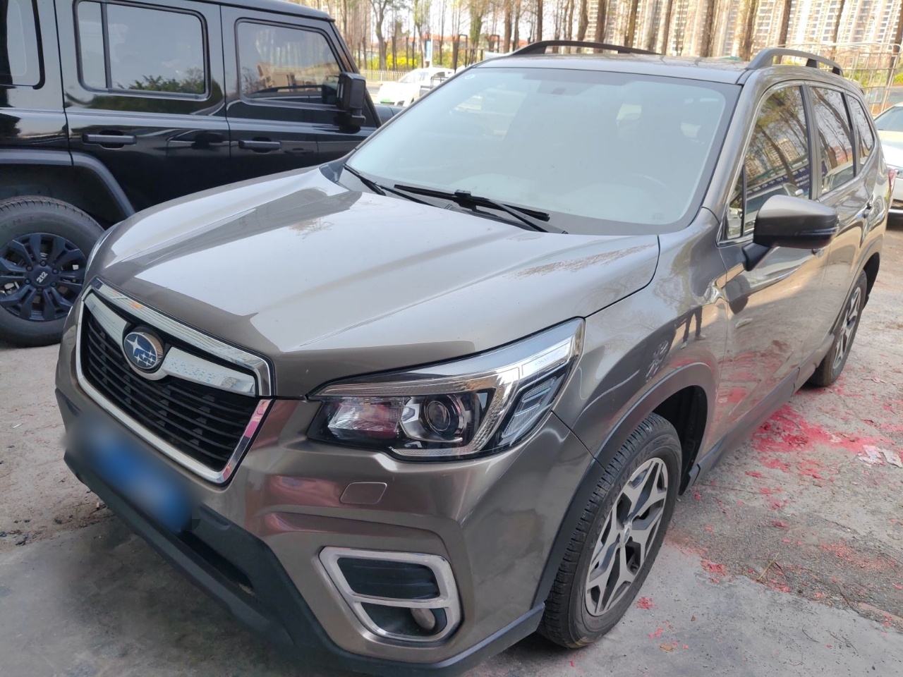 Под передней частью автомобиля