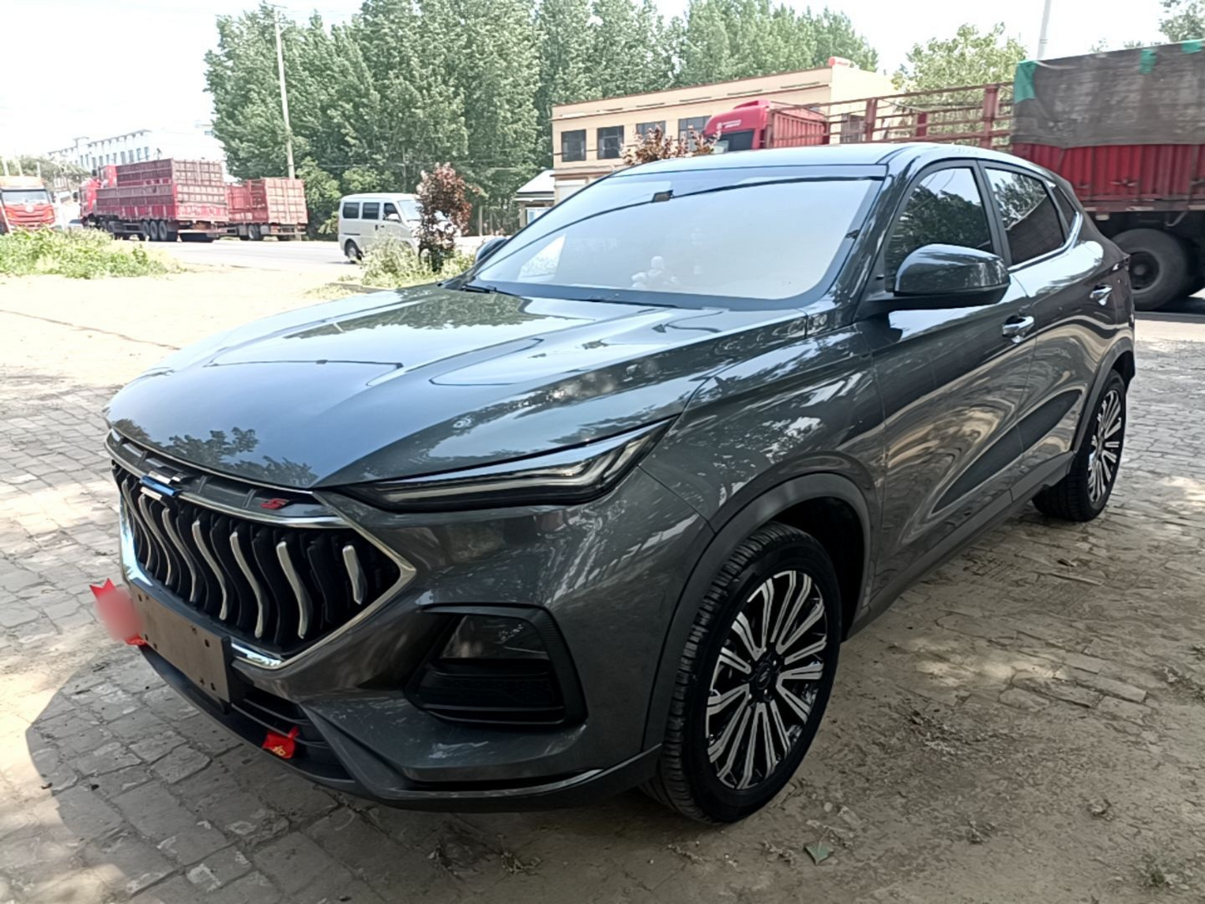 Под передней частью автомобиля