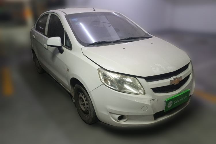 Used Chevrolet Sail 2013 Sedan 1.2L Manual Fashionable Happiness Edition Front Right 45 Deg