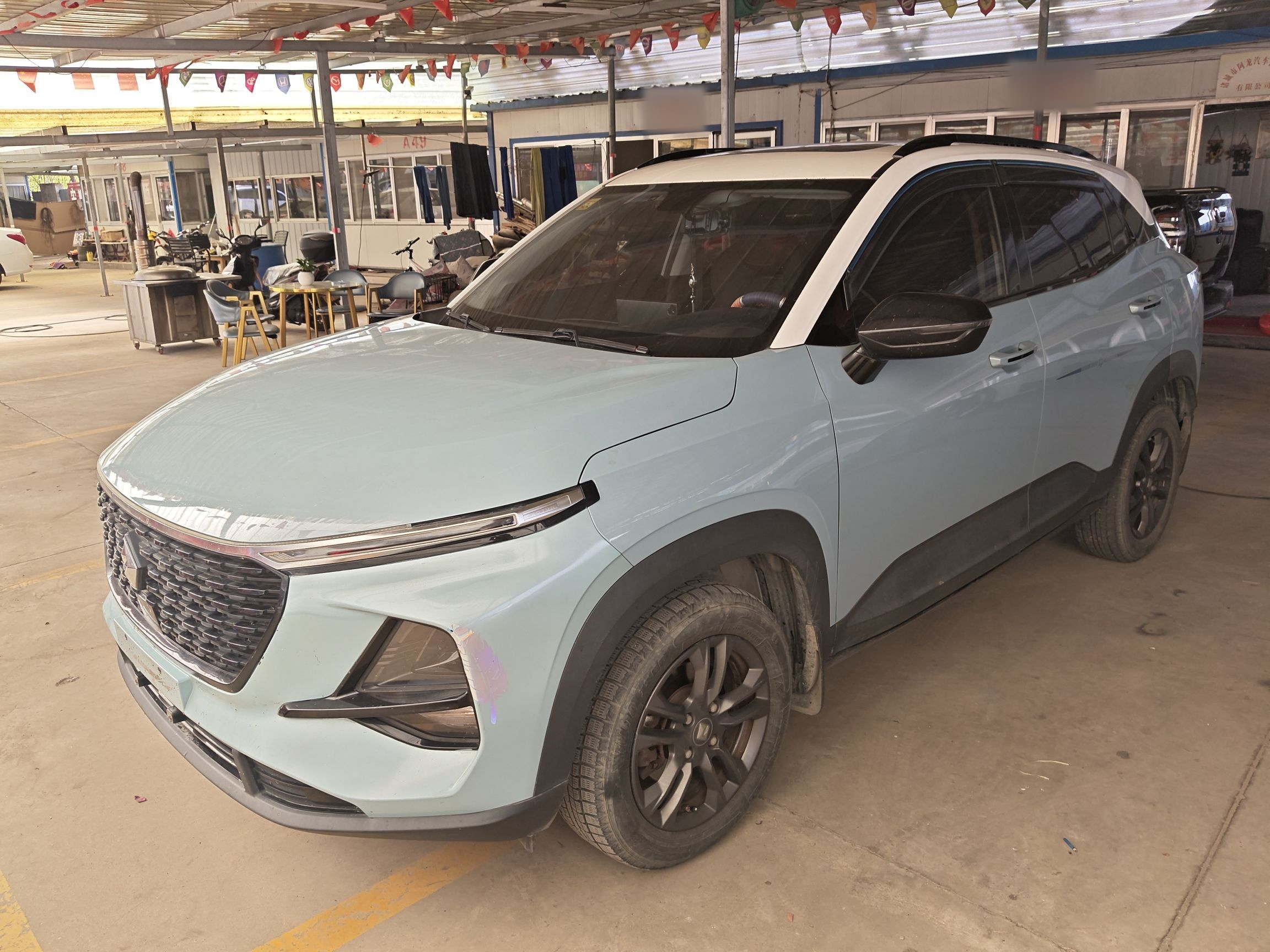 Под передней частью автомобиля