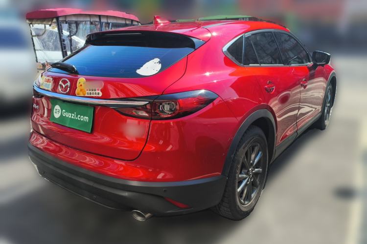 Used Mazda CX-4 2021 2.0L Automatic Two-Wheel Drive Blue Sky Dynamic Edition Rear Right 45 Deg