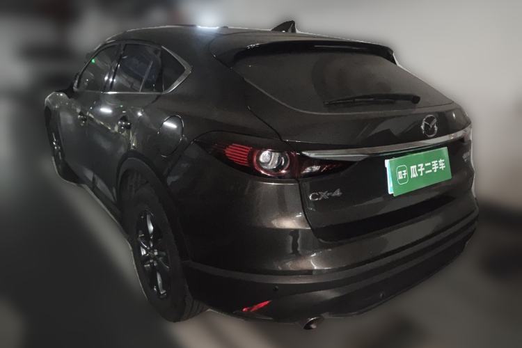 Used Mazda CX-4 2020 2.0L Automatic Two-Wheel Drive Blue Sky Dynamic Edition Rear Left 45 Deg