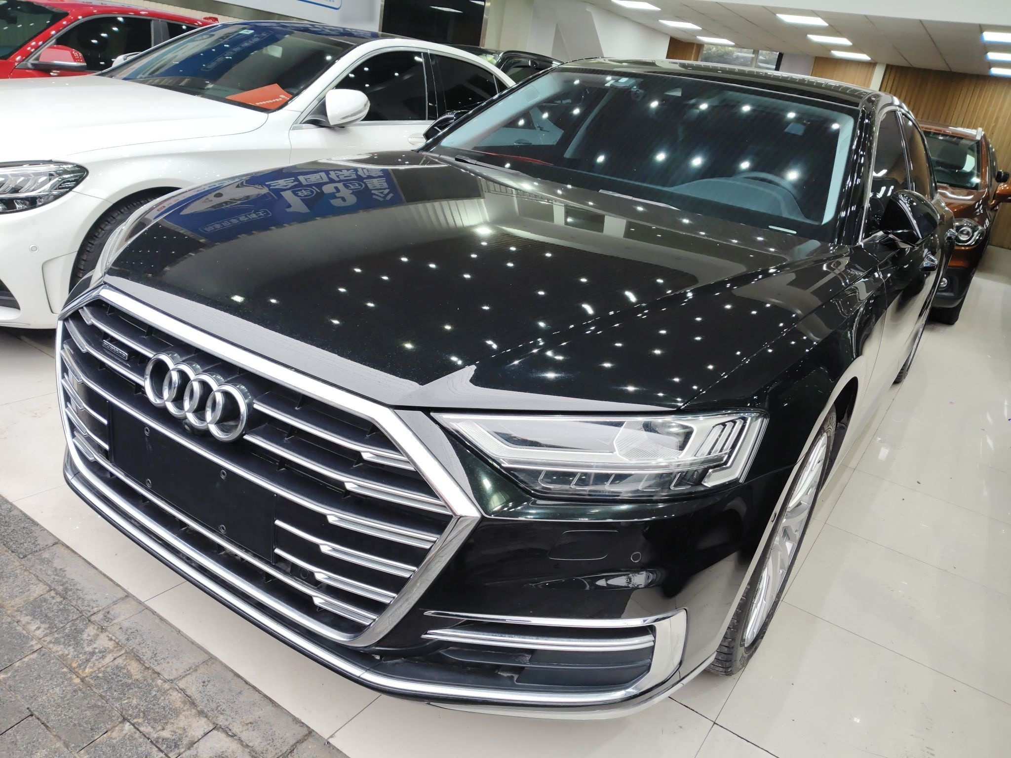 Под передней частью автомобиля