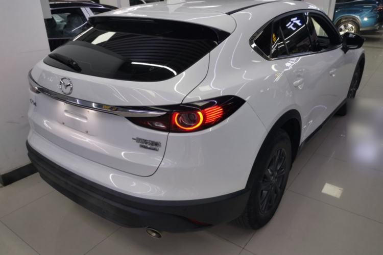 Used Mazda CX-4 2021 2.0L Automatic Two-Wheel Drive Blue Sky Exploration Edition Rear Right 45 Deg