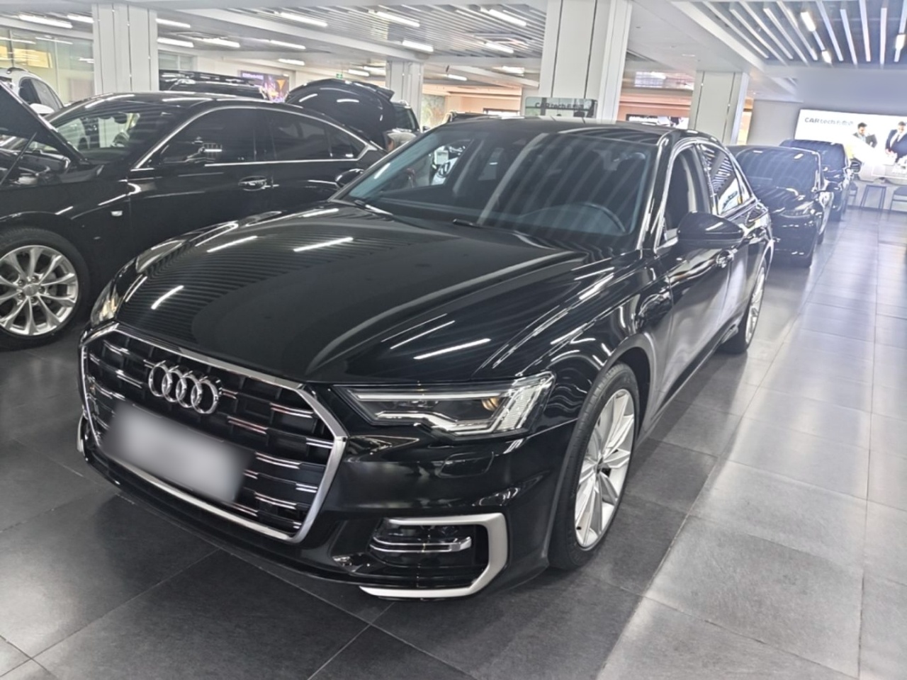 Под передней частью автомобиля