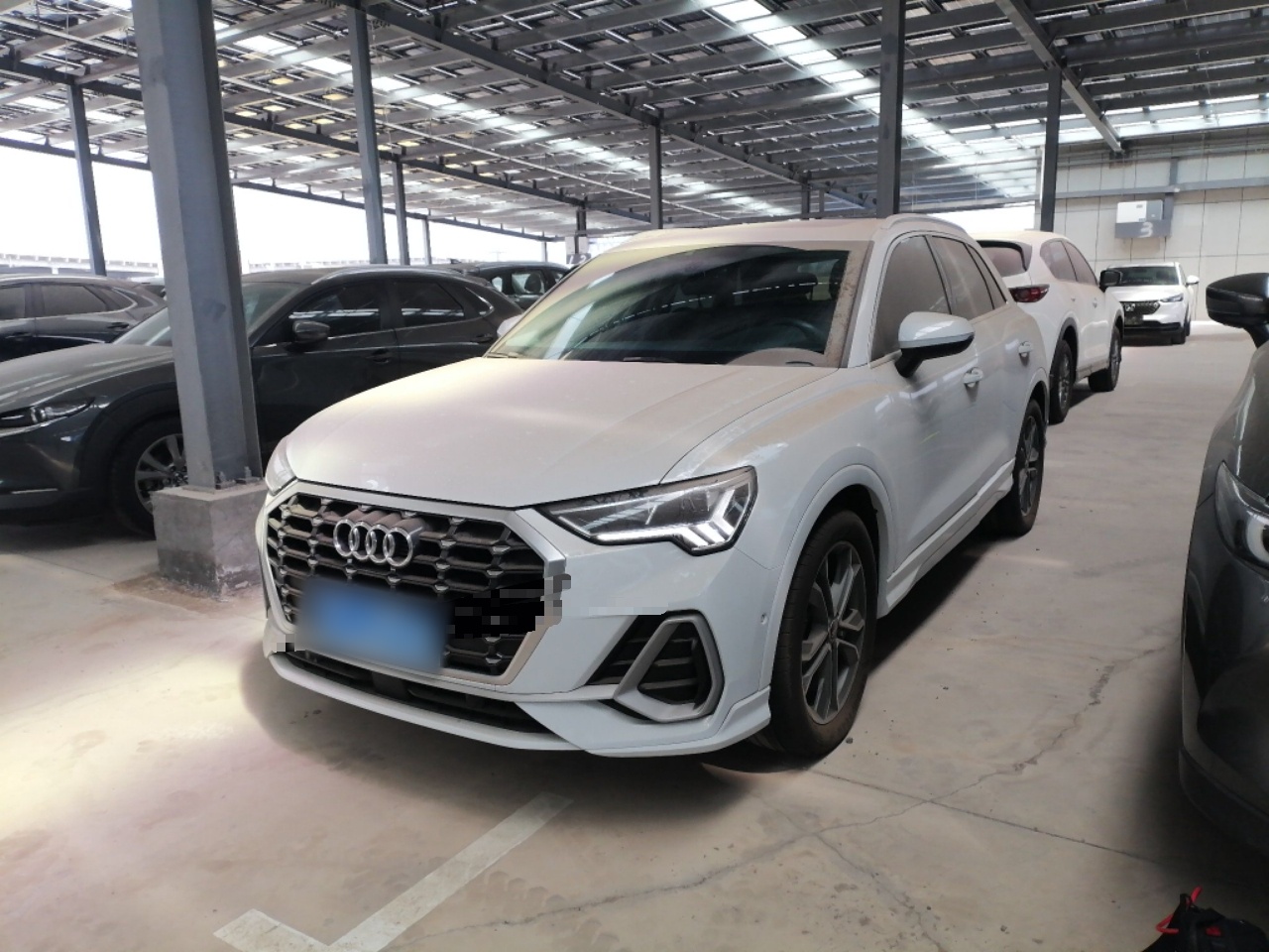 Под передней частью автомобиля