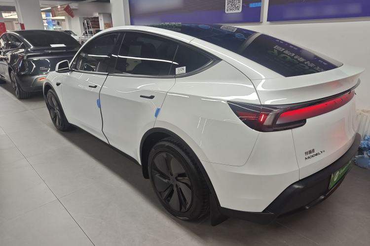 Used Tesla Model Y 2025 Long-Range All-Wheel Drive First Edition Rear Left 45 Deg