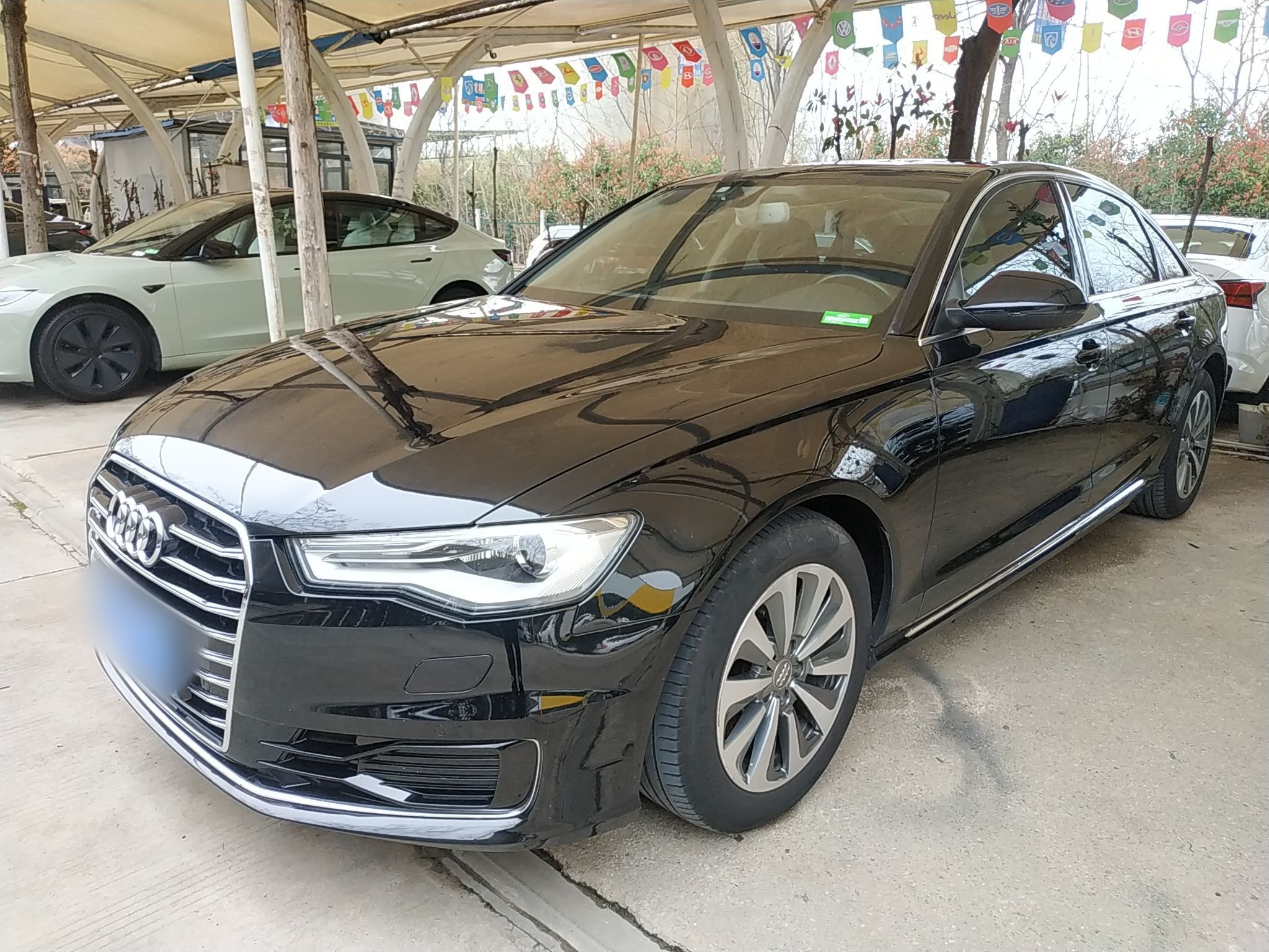 Под передней частью автомобиля