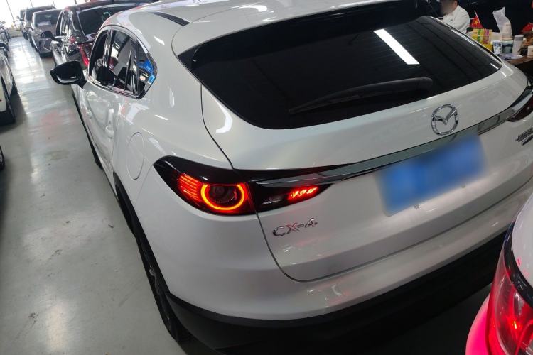 Used Mazda CX-4 2020 2.0L Automatic Two-Wheel Drive Blue Sky Dynamic Edition Rear Left 45 Deg