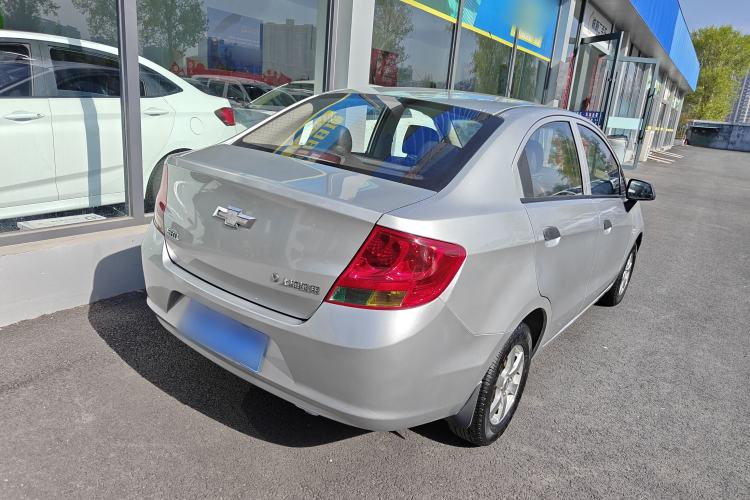 Used Chevrolet Sail 2013 Sedan 1.2L Manual Fashionable Happiness Edition Rear Right 45 Deg