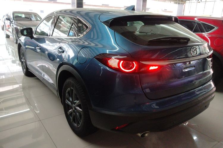 Used Mazda CX-4 2020 2.0L Automatic Two-Wheel Drive Blue Sky Dynamic Edition Rear Left 45 Deg