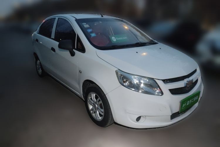 Used Chevrolet Sail 2013 Sedan 1.4L Manual Ideal Happiness Edition Front Right 45 Deg