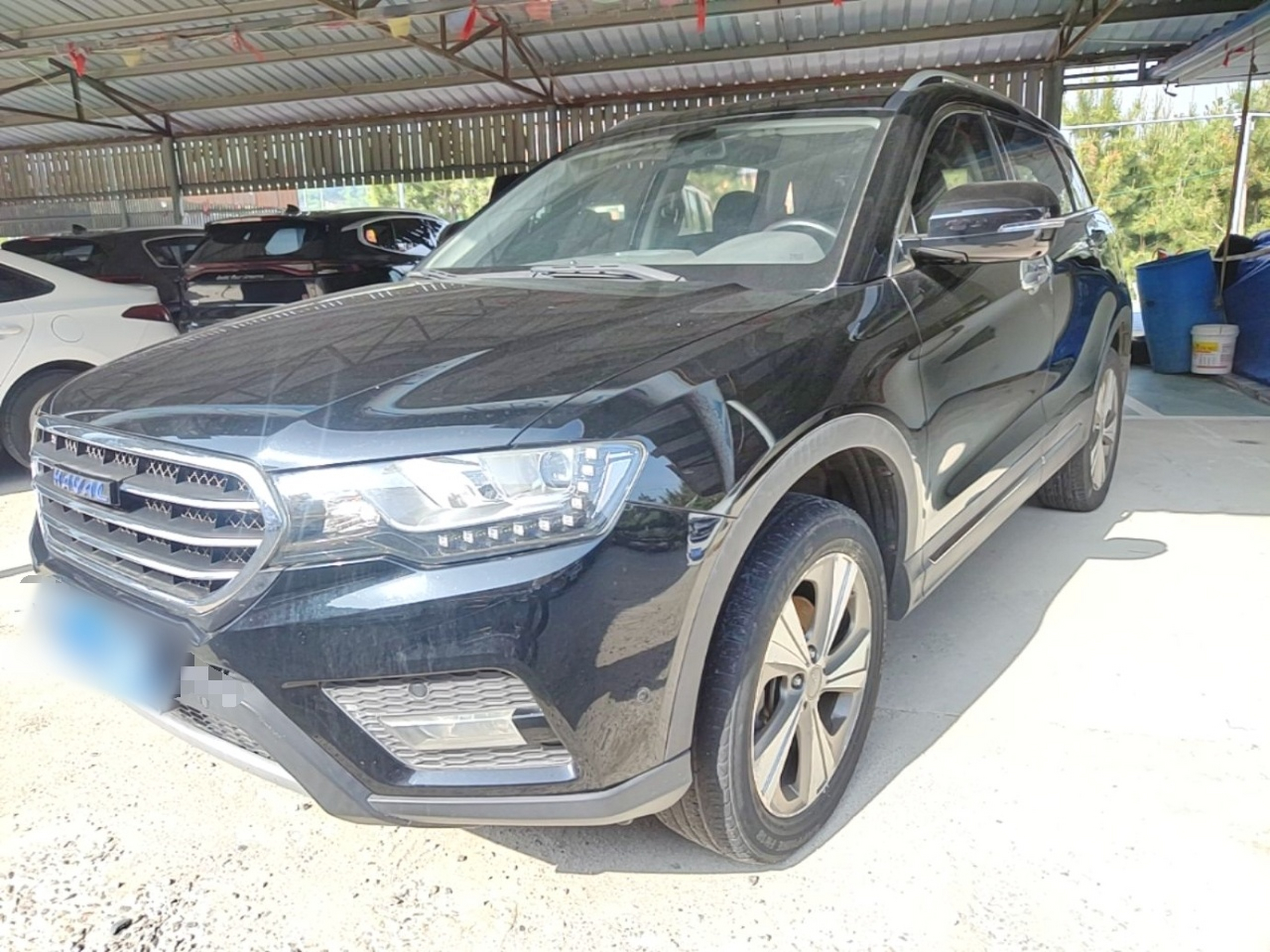 Под передней частью автомобиля