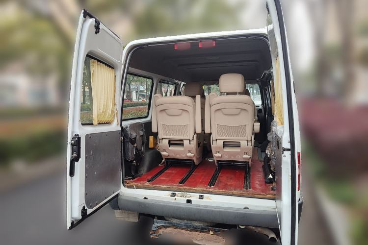 Used JMC Transit 2019 2.8T Commercial Version Intelligent Automatic Transmission Short Wheelbase Mid-Roof Design 6 Seats China VI Emission Standard – JX493 Trunk