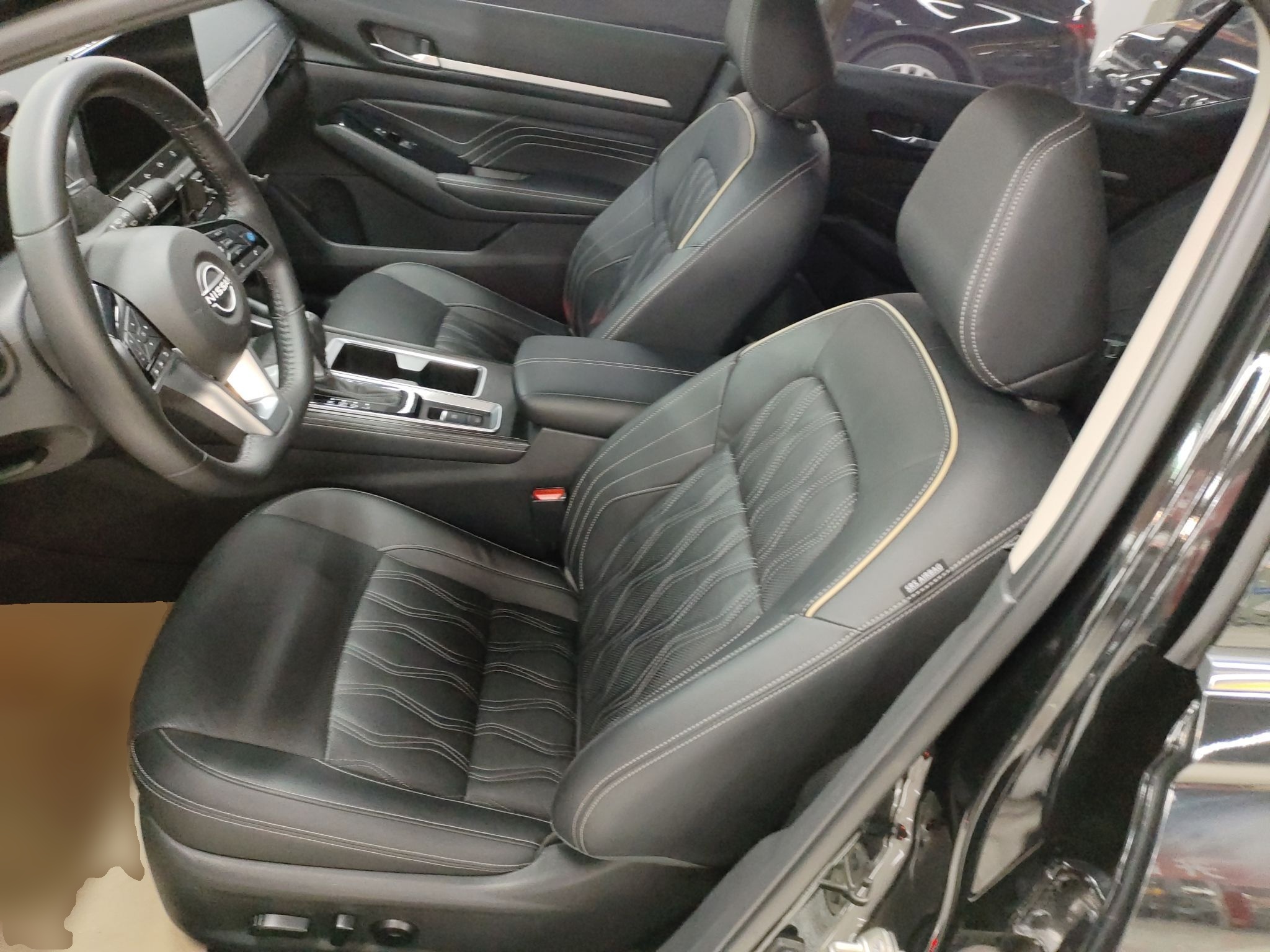 Переднее сиденье в автомобиле