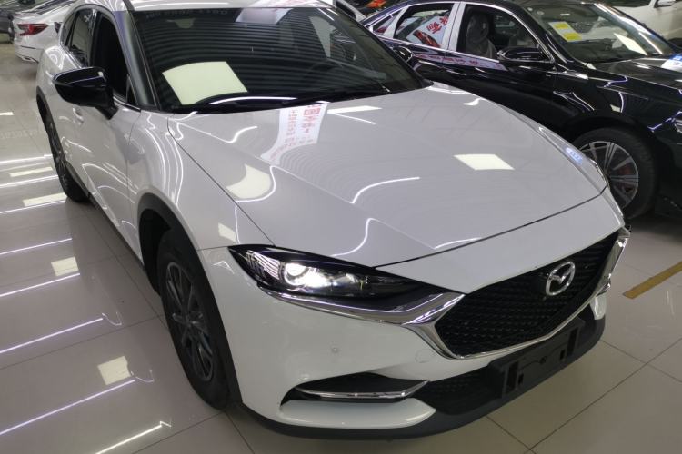 Used Mazda CX-4 2021 2.0L Automatic Two-Wheel Drive Blue Sky Exploration Edition Front Right 45 Deg