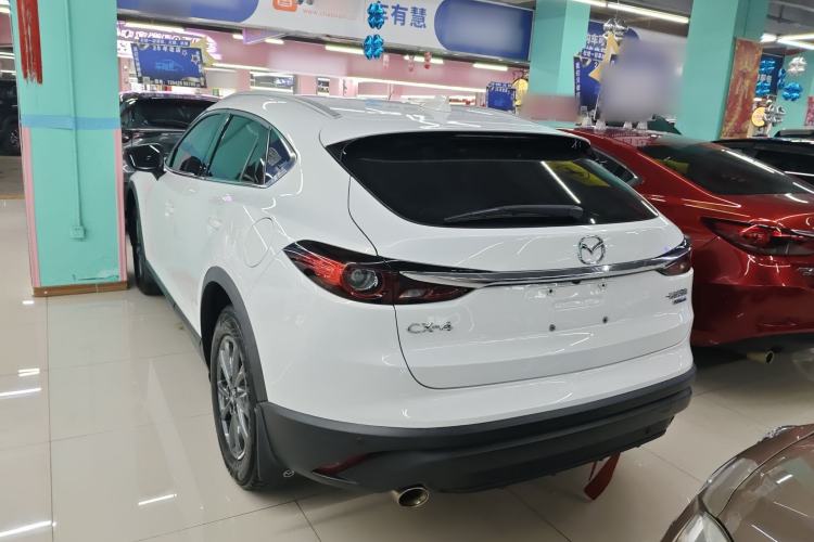 Used Mazda CX-4 2020 2.0L Automatic Two-Wheel Drive Blue Sky Dynamic Edition Rear Left 45 Deg