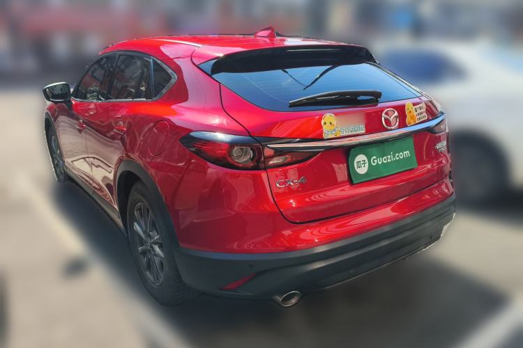 Used Mazda CX-4 2021 2.0L Automatic Two-Wheel Drive Blue Sky Dynamic Edition Rear Left 45 Deg