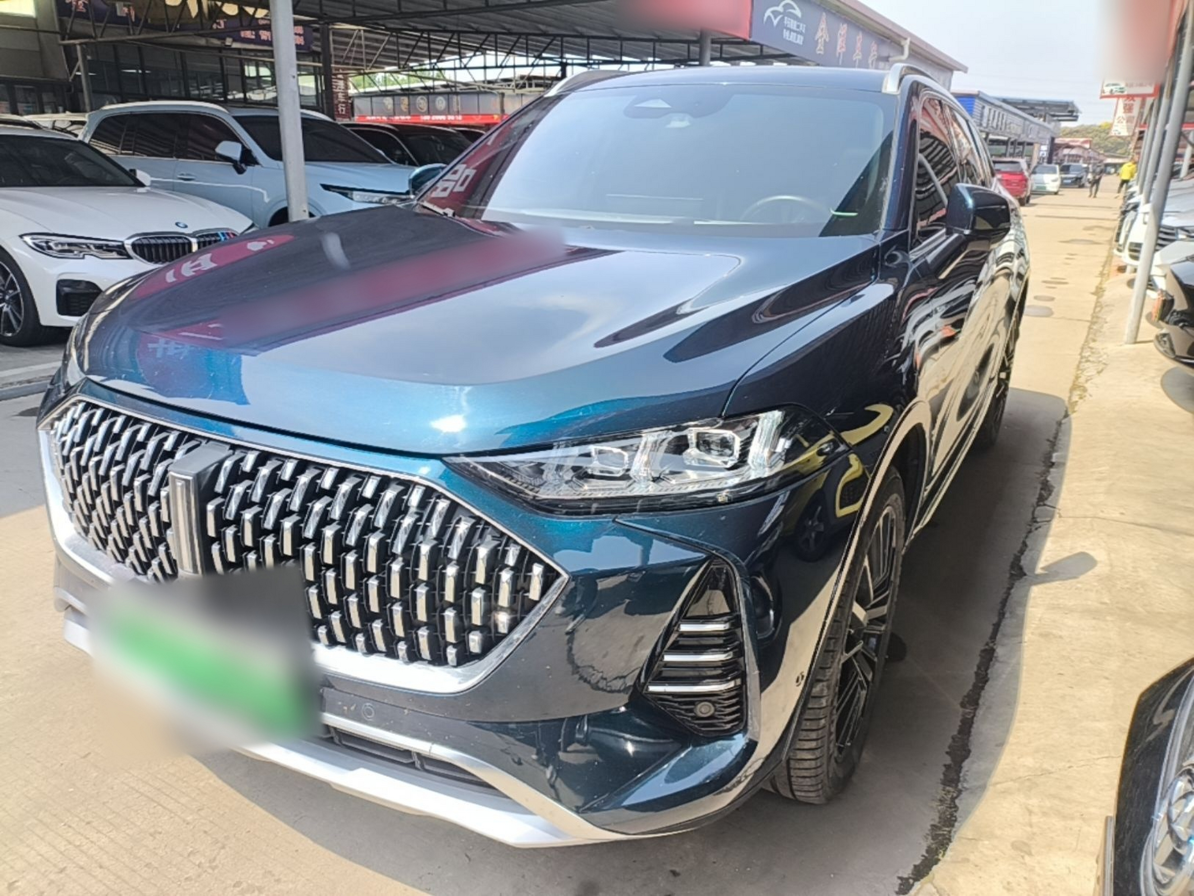 Под передней частью автомобиля