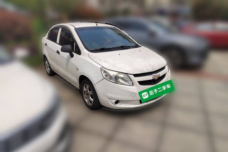 Used Chevrolet Sail 2013 Sedan 1.4L Manual Ideal Happiness Edition Front Right 45 Deg