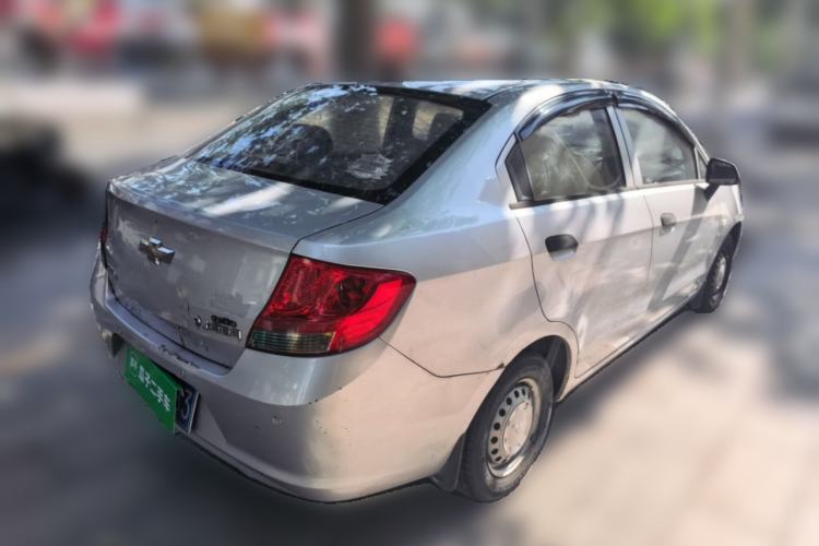 Used Chevrolet Sail 2013 Sedan 1.2L Manual Fashionable Happiness Edition Rear Right 45 Deg