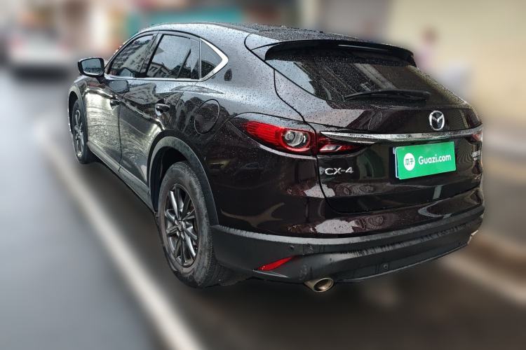 Used Mazda CX-4 2021 2.0L Automatic Two-Wheel Drive Blue Sky Exploration Edition Rear Left 45 Deg