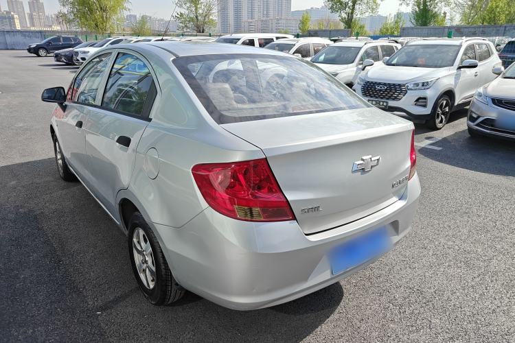 Used Chevrolet Sail 2013 Sedan 1.2L Manual Fashionable Happiness Edition Rear Left 45 Deg