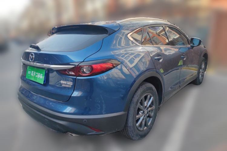 Used Mazda CX-4 2021 2.0L Automatic Two-Wheel Drive Blue Sky Luxury Edition Rear Right 45 Deg