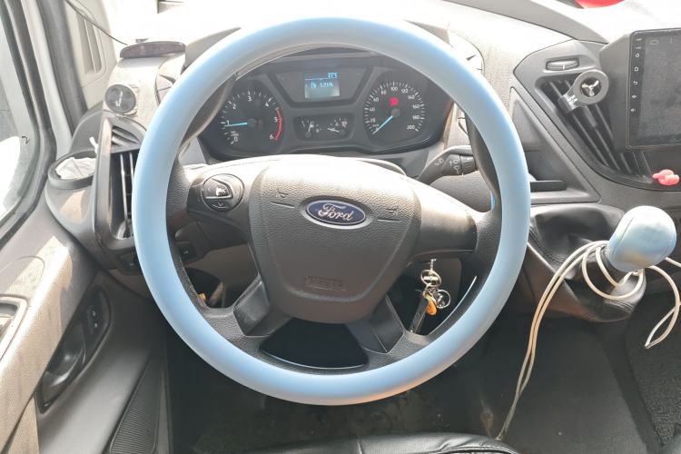 Used Ford Transit 2020 2.0T Diesel Multi-Function Commercial Vehicle Mid-Chassis Low-Roof Design with Dual Rear Doors Meeting China VI Emission Standards Steering Wheel