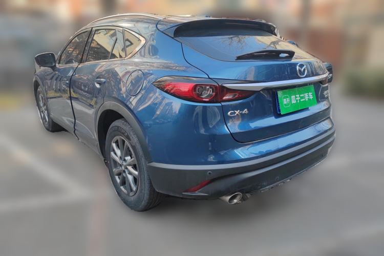 Used Mazda CX-4 2021 2.0L Automatic Two-Wheel Drive Blue Sky Luxury Edition Rear Left 45 Deg
