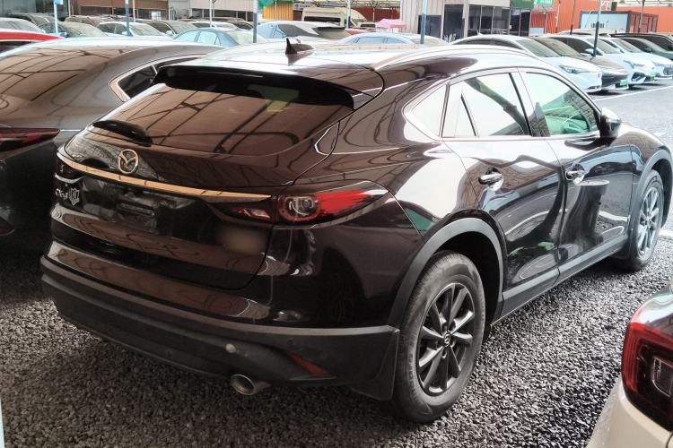 Used Mazda CX-4 2021 2.0L Automatic Two-Wheel Drive Blue Sky Exploration Edition Rear Right 45 Deg