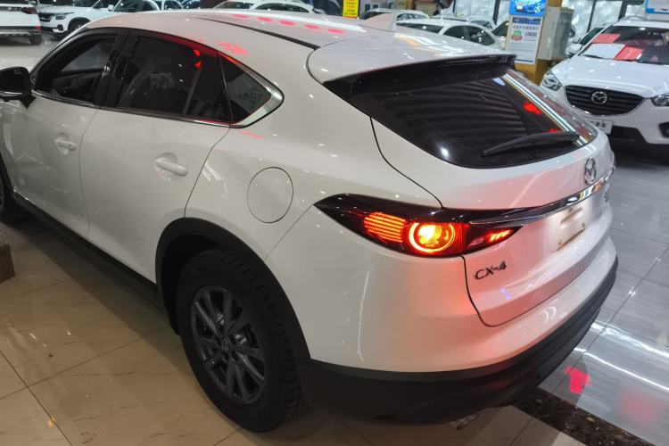 Used Mazda CX-4 2021 2.0L Automatic Two-Wheel Drive Blue Sky Dynamic Edition Rear Left 45 Deg