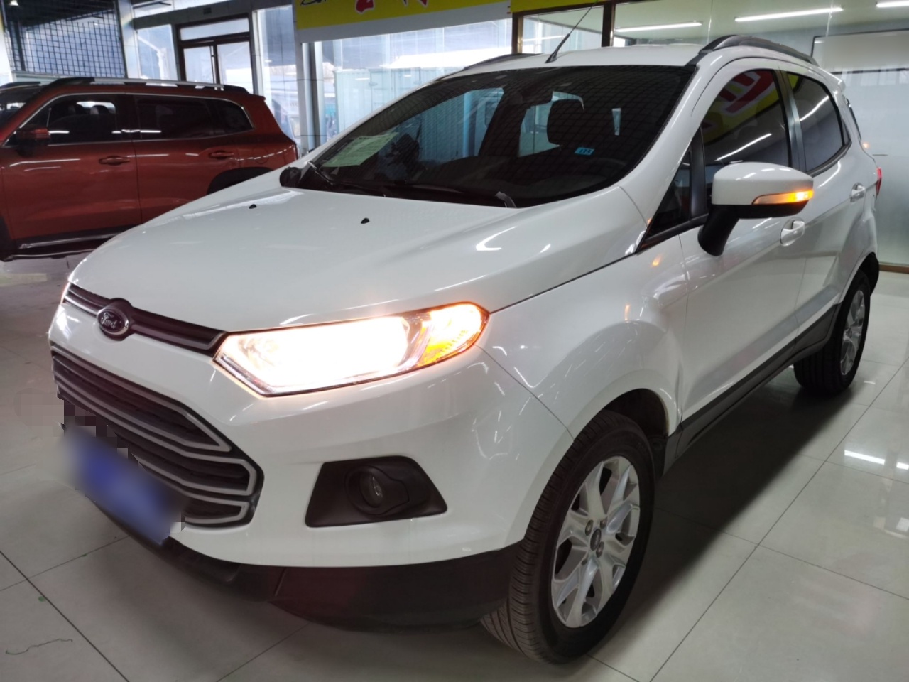 Под передней частью автомобиля