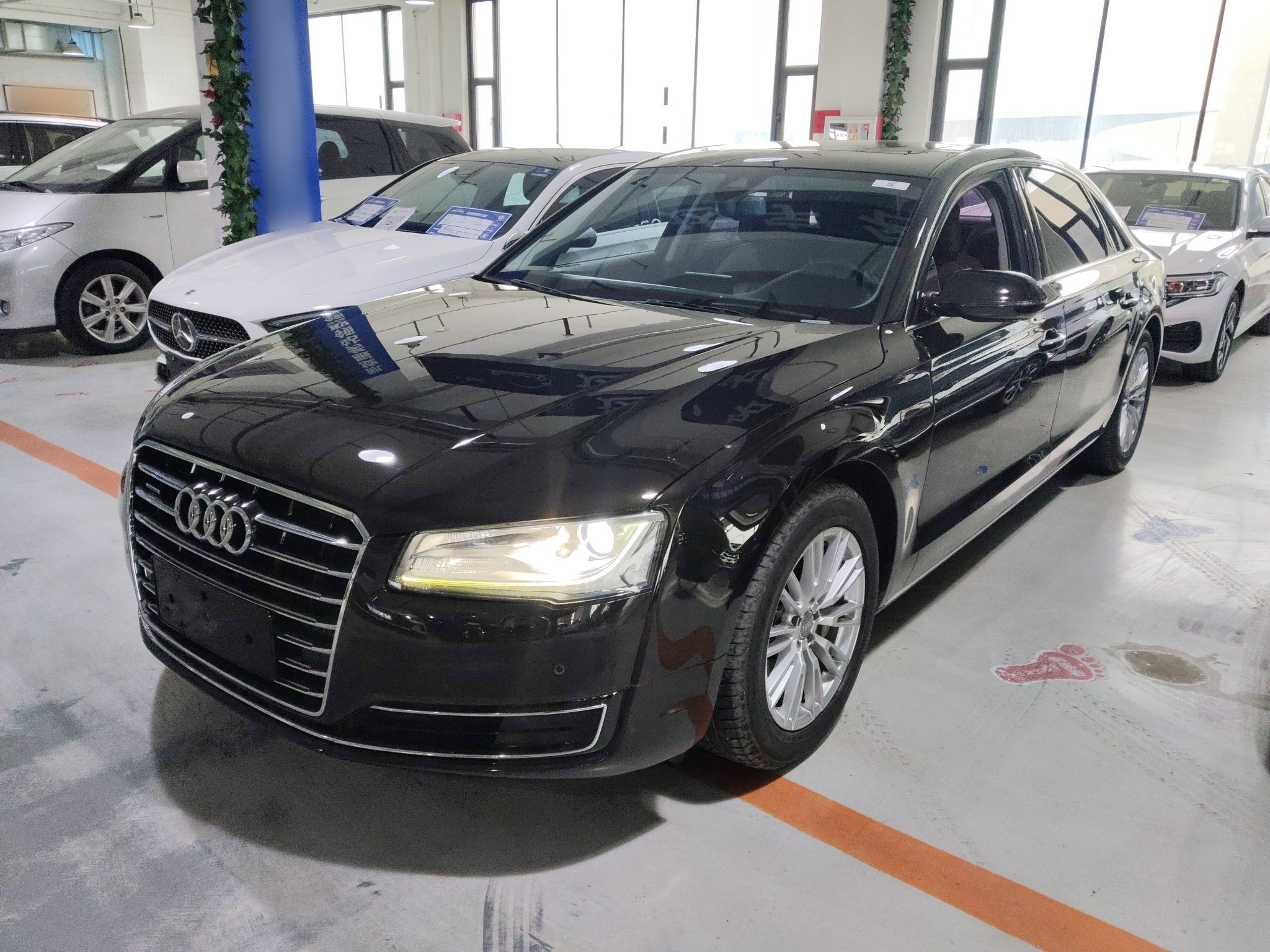 Под передней частью автомобиля