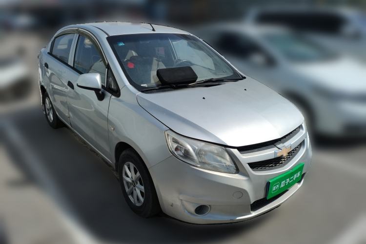 Used Chevrolet Sail 2013 Sedan 1.2L Manual Fashionable Happiness Edition Front Right 45 Deg
