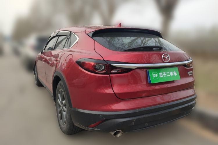 Used Mazda CX-4 2021 2.0L Automatic Two-Wheel Drive Blue Sky Dynamic Edition Rear Left 45 Deg