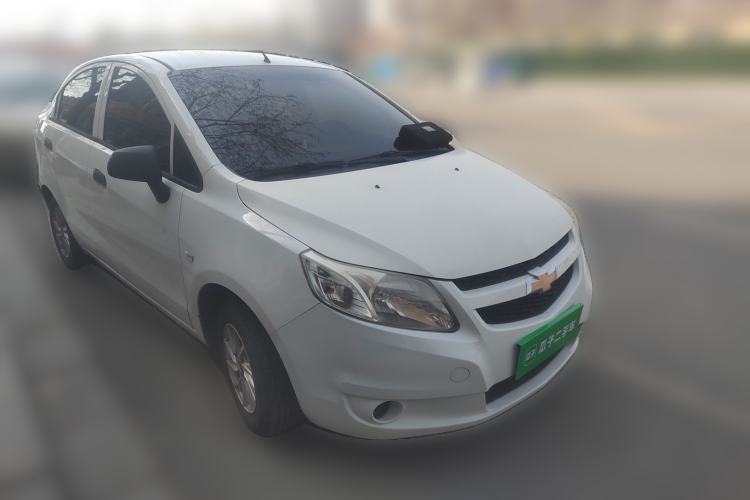 Used Chevrolet Sail 2013 Sedan 1.2L Manual Fashionable Happiness Edition Front Right 45 Deg
