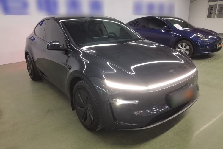 Used Tesla Model Y 2025 Long-Range All-Wheel Drive First Edition Front Right 45 Deg