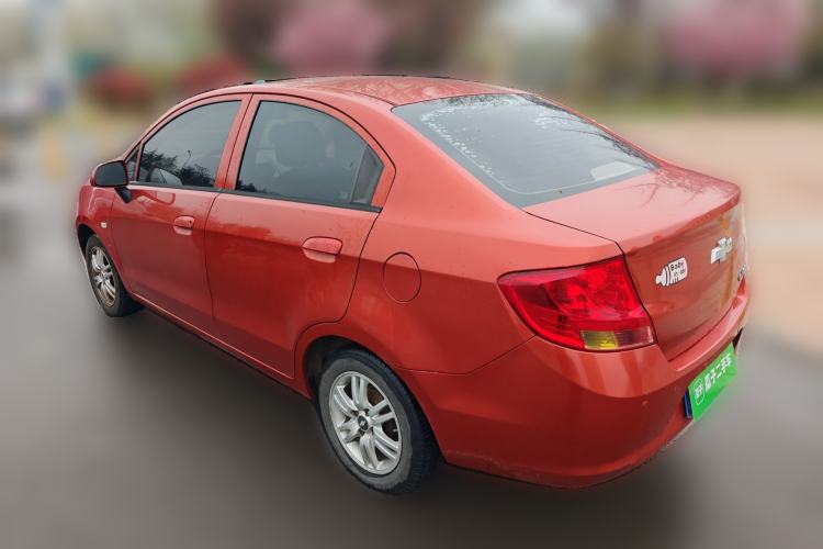 Used Chevrolet Sail 2013 Sedan 1.4L Manual Happiness Edition II Rear Left 45 Deg